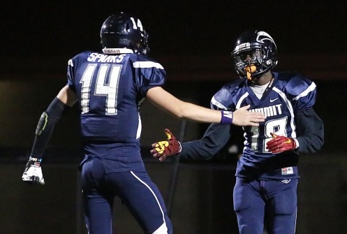 Summit QB Cade Sparks (left) and Ronald Draper II celebrate their 95-yard touchdown in Week 9. / Photo by DOUG BENC for The Press-Enterprise